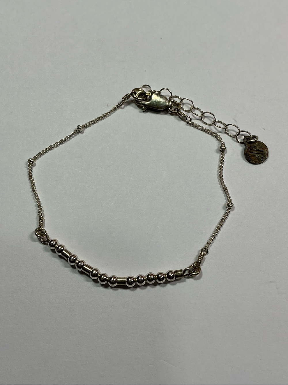 Sterling Silver Morse Code Adjustable Bracelet spelling the word LOVE